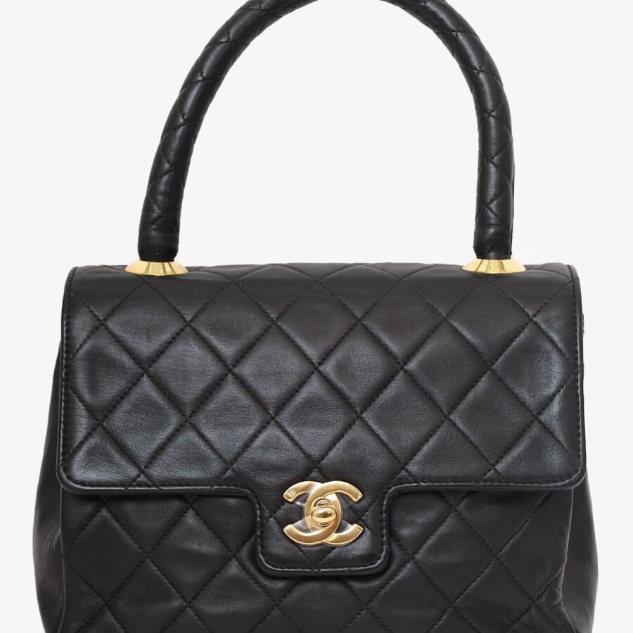 Chanel -94 Black Quilted Lambskin Kelly Top Handle Bag | Studio Nafay