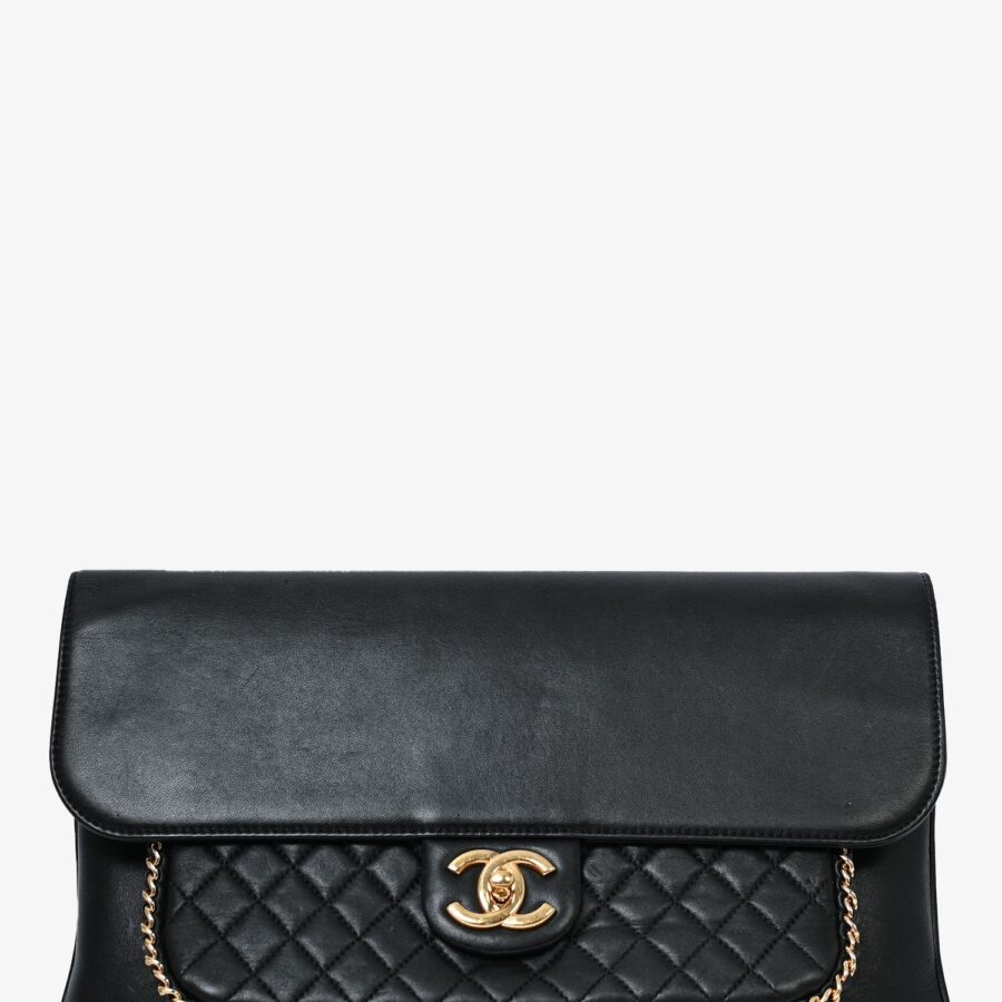 Chanel /18 Black Lambskin 'Unchained' CC Clutch | Studio Nafay