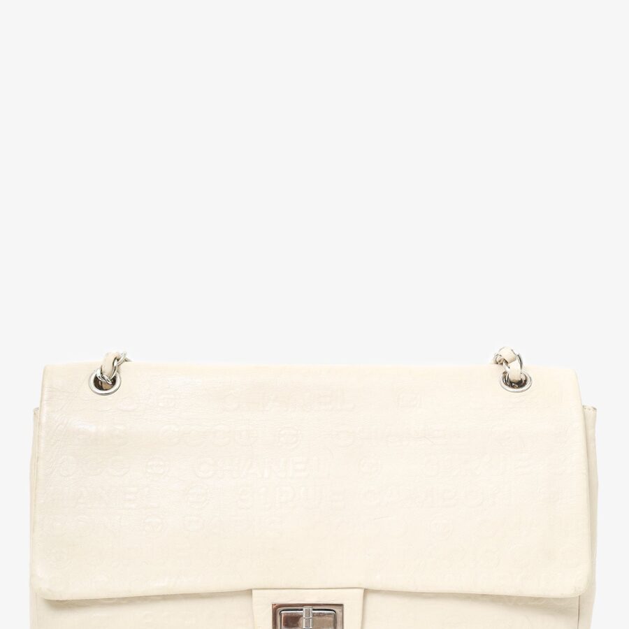 Chanel -09 White Embossed CC Calfskin Unlimited Reissue 228 Flap Bag | Studio Nafay