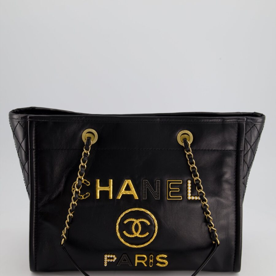 *HOT* Chanel Black Small Deauville Tote Bag in Shiny Calfskin Leather with Antique Gold Hardware and Pearl, Crystal Logo Detail | Studio Nafay