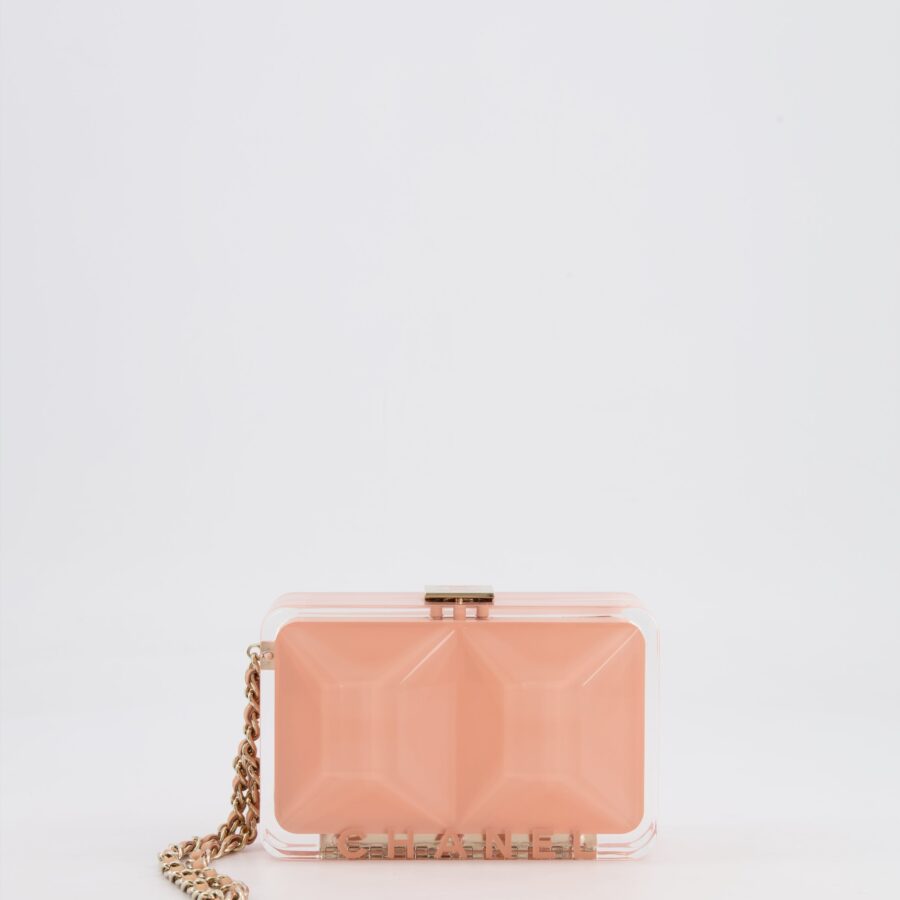 Chanel Pink Plexiglass Clutch Bag With Champagne Hardware and Logo Detail | Studio Nafay