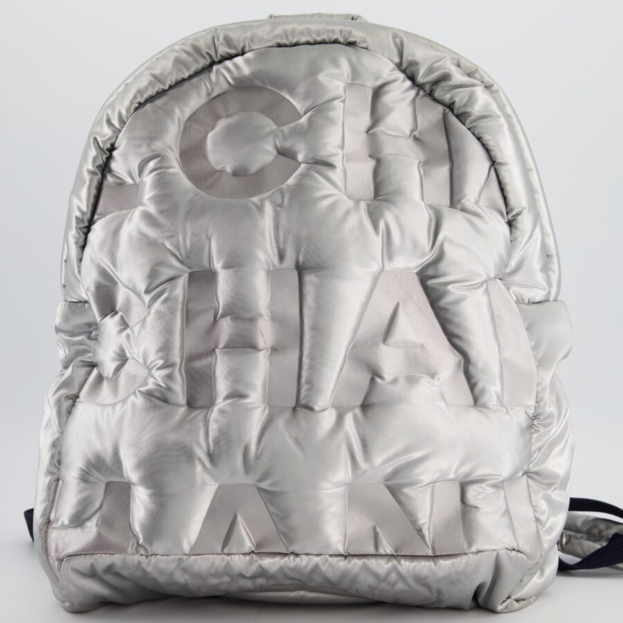 Chanel Silver Doudoune Backpack with Embossed Logo in Silver Nylon with Silver Hardware | Studio Nafay