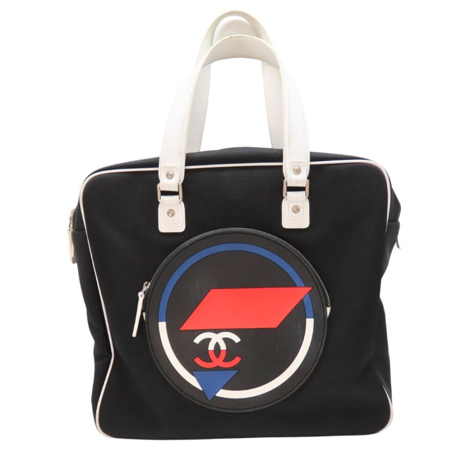 Chanel Airline Canvas Leather Handbag | Studio Nafay