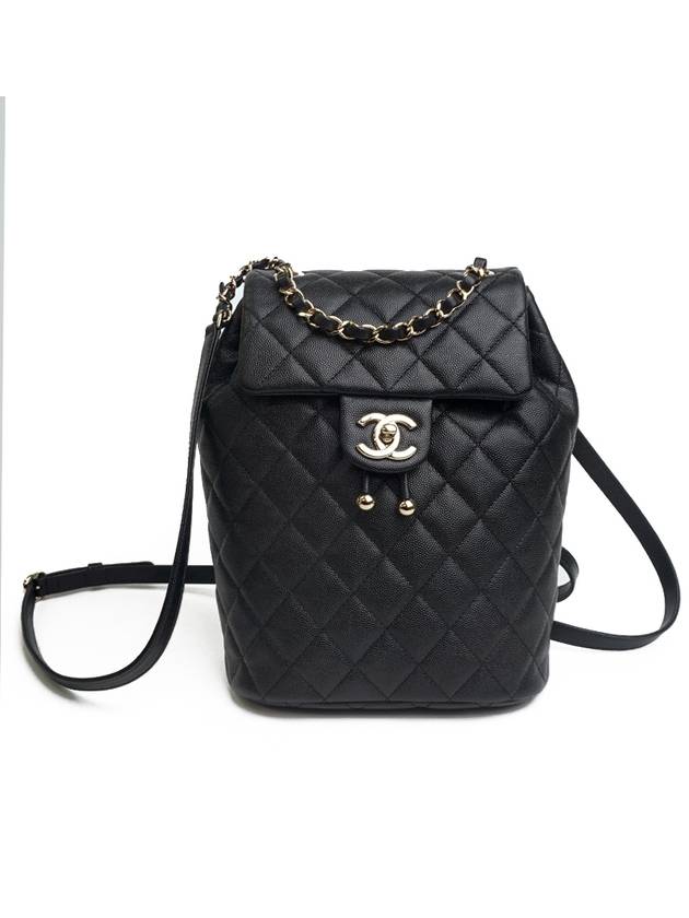 Backpack Grained Shiny Calfskin Gold Metal Black Chanel | Studio Nafay