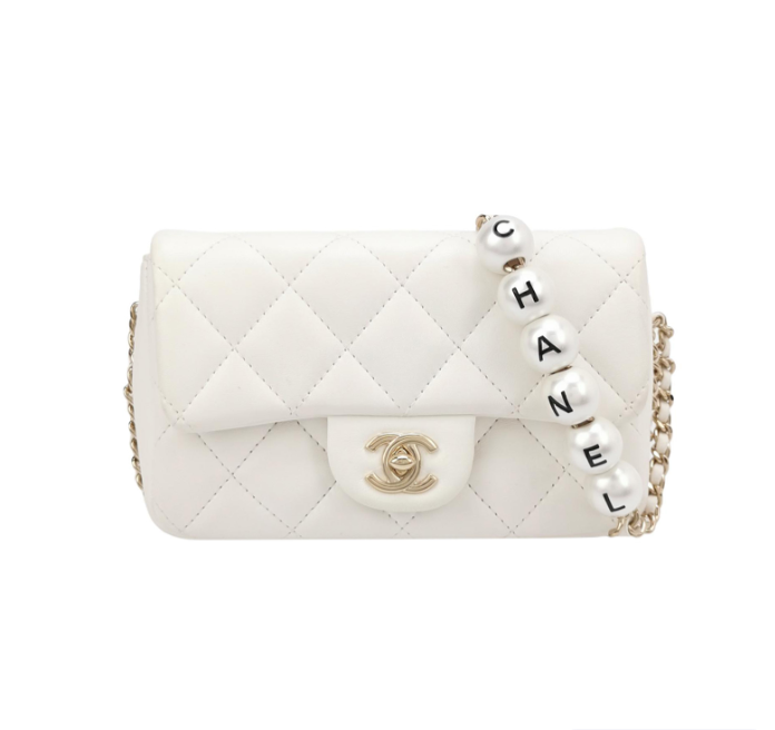 Chanel flap bag **cm white sheepskin | Studio Nafay