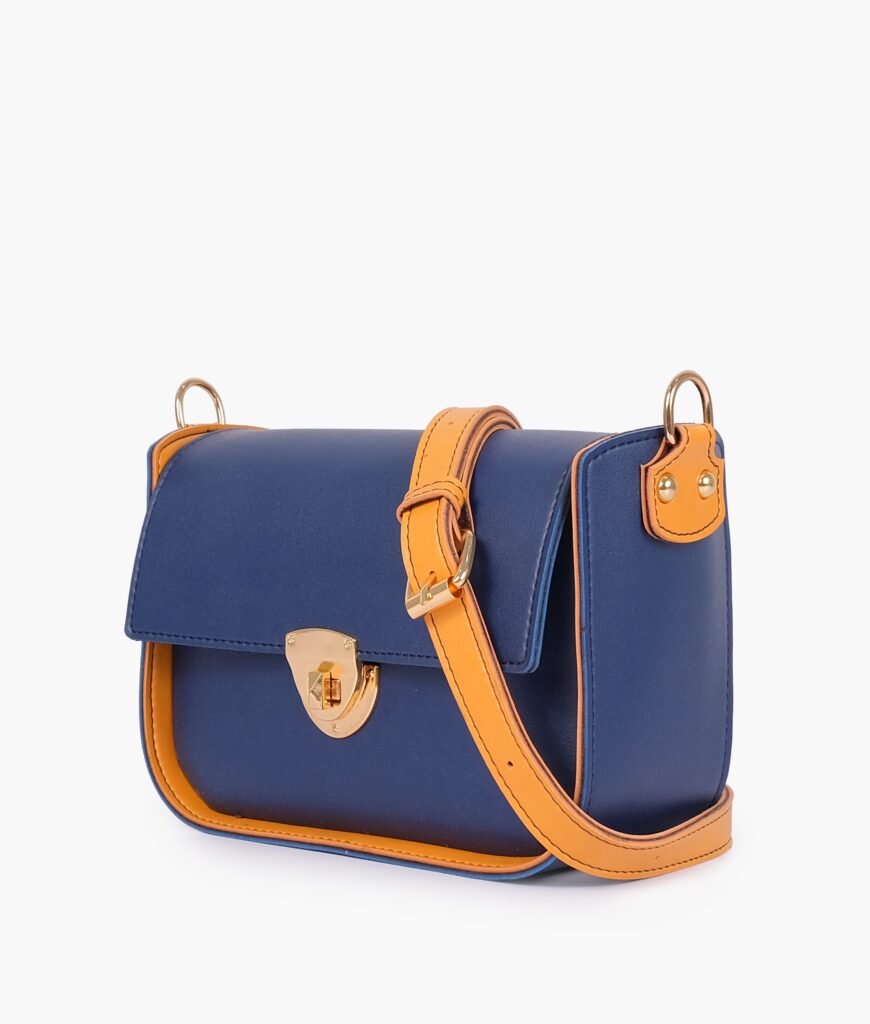 Blue saddle bag with twist lock | Studio Nafay