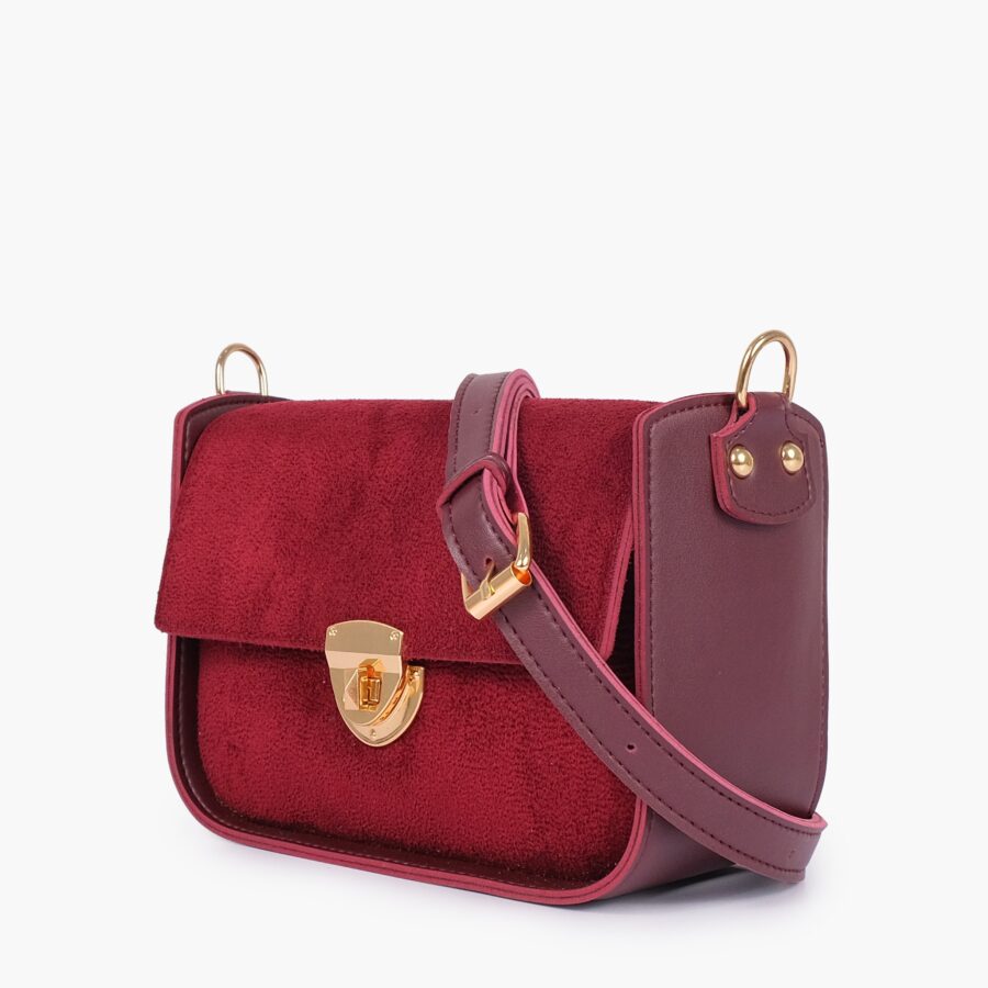 Burgundy suede saddle bag with twist lock | Studio Nafay