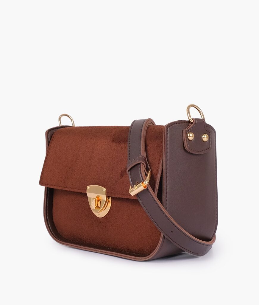 Dark brown suede saddle bag with twist lock | Studio Nafay