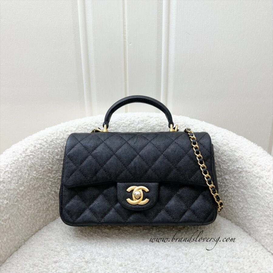 Chanel Top Handle Mini Rectangle Flap in 21S Black Caviar and AGHW Handbag | Studio Nafay