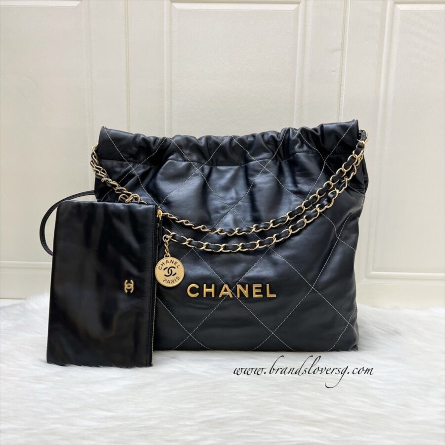 Chanel 22 Medium Hobo Handbag in Black Calfskin with White Stitch Quilting and AGHW (Model: ) | Studio Nafay
