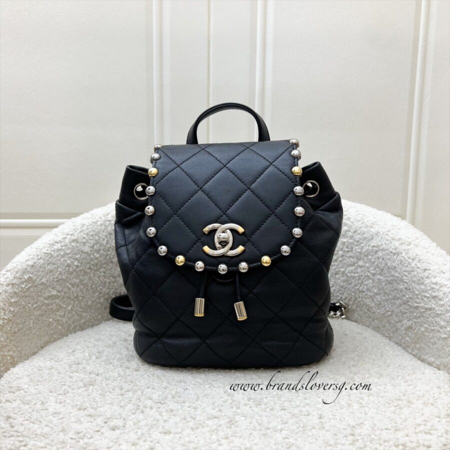 Chanel Studded Mini Backpack in Black Calfskin and 2-tone HW | Studio Nafay