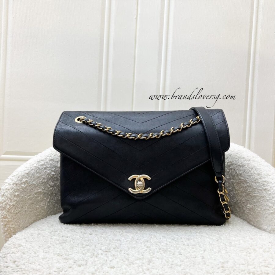 Chanel Medium Envelope Flap Bag in Chevron Quilted Black Calfskin and AGHW | Studio Nafay