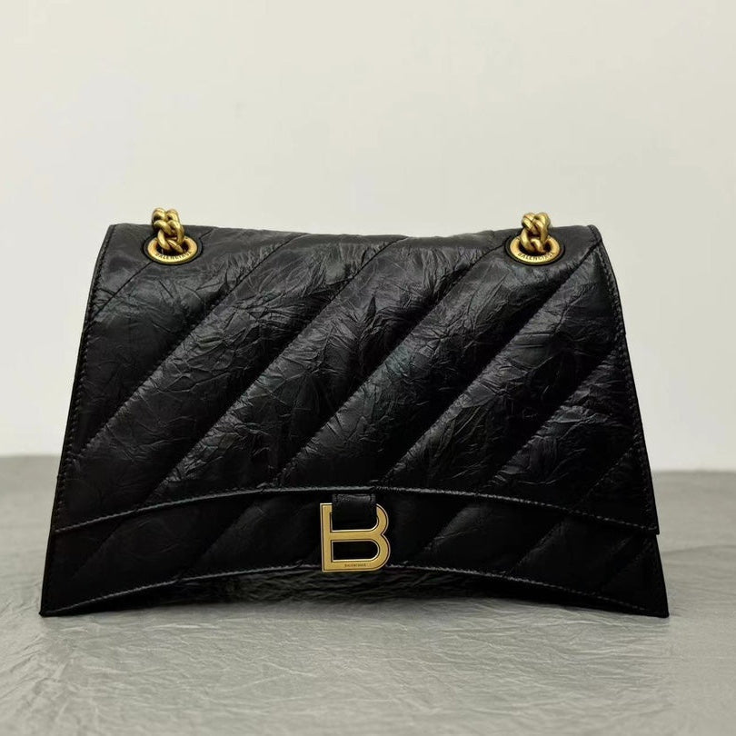 CRUSH MEDIUM CHAIN BAG 31 IN BLACK QUILTED CRUSHED CALFSKIN GOLD HARDWARE | Studio Nafay