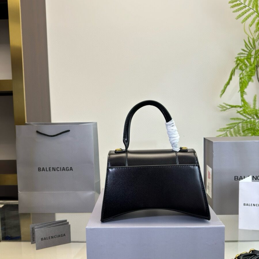HOURGLASS HANDBAG 22 IN BLACK SHINY BOX CALFSKIN GOLD HARDWARE | Studio Nafay