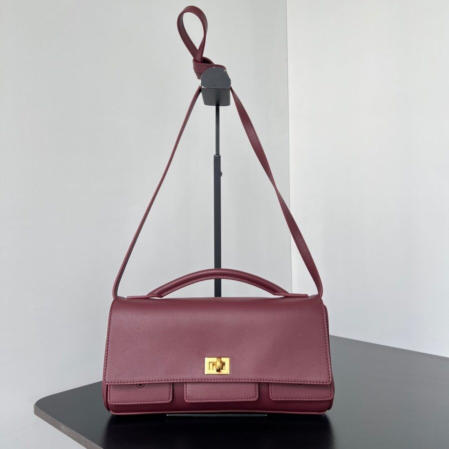 BEL AIR CLUTCH 27 IN BURGUNDY RED NAPPA LAMBSKIN GOLD HARDWARE | Studio Nafay