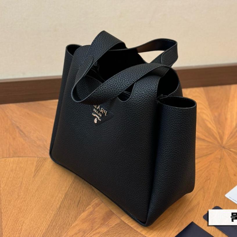 PRA 25 BASKET BAG IN BLACK CALFSKIN | Studio Nafay