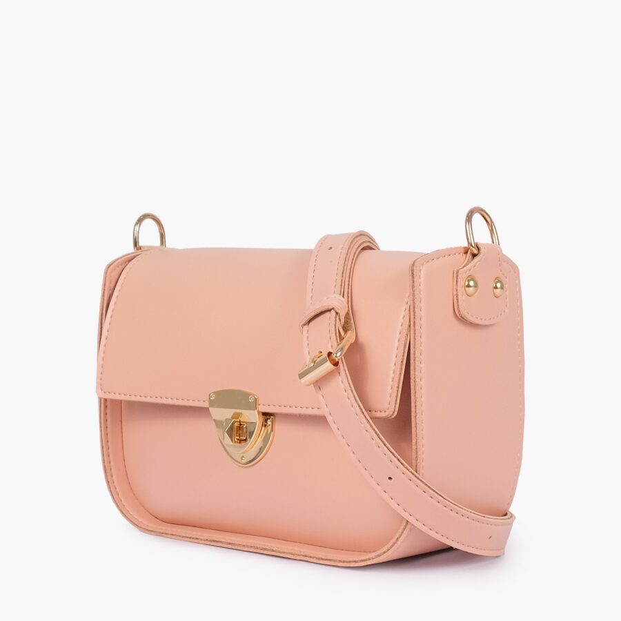 Peach saddle bag with twist lock | Studio Nafay