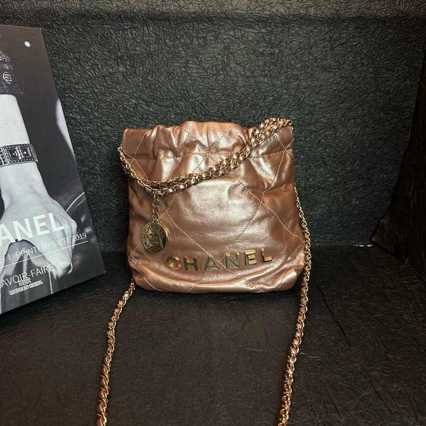 Chanel Copper Pink 22 Bag Mini Chip Crossbody Bag | Studio Nafay