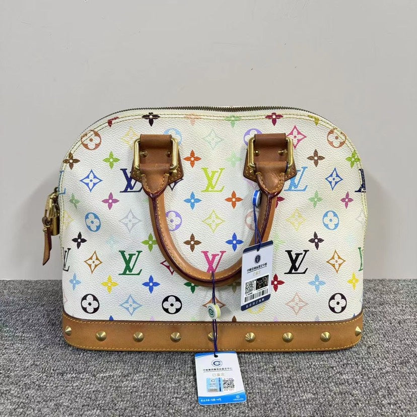 Louis Vuitton Alma Multicolor Handbag | Studio Nafay