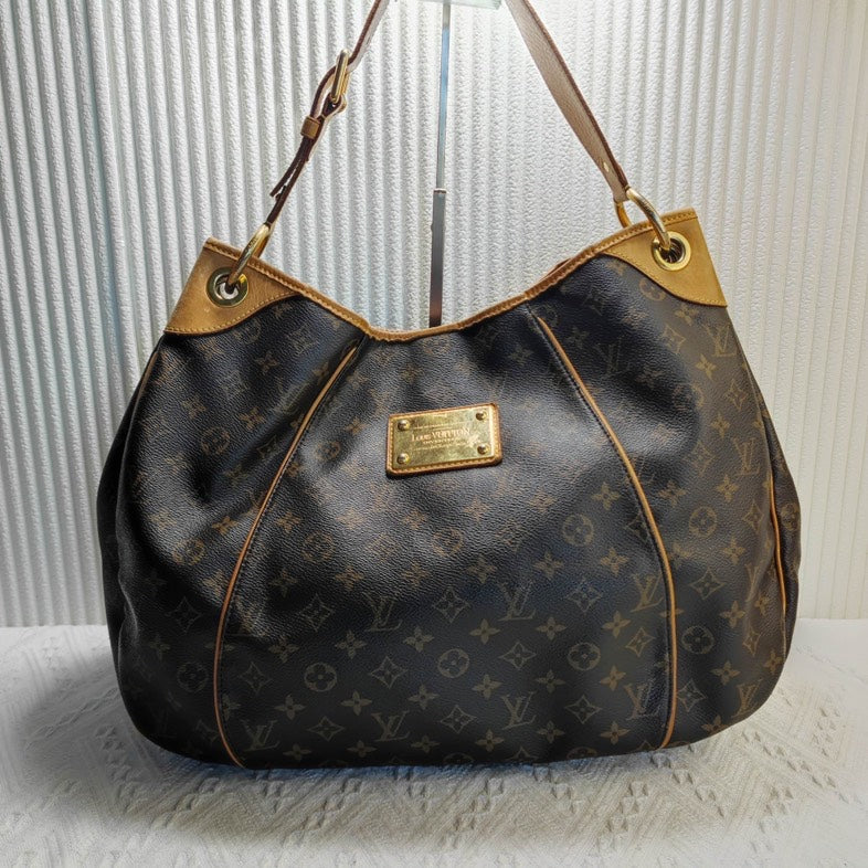 Louis Vuitton Monogram Canvas Hobo Bag in Brown