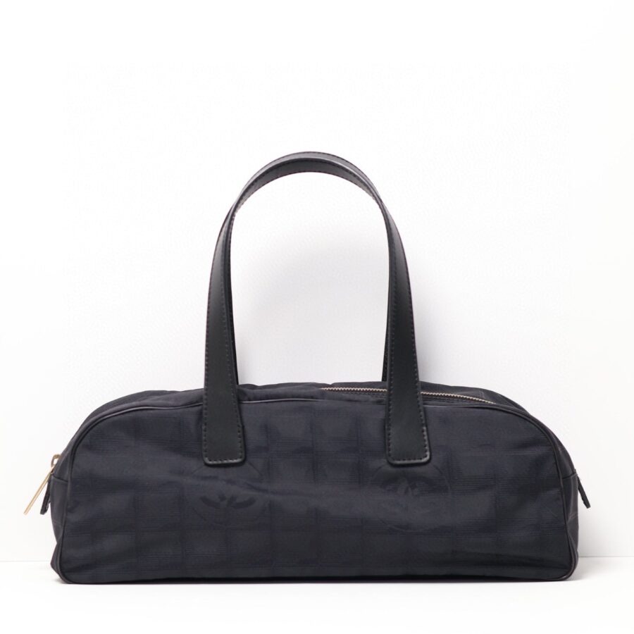 Chanel Travel Line All Black Baguette Satchel Bag | Studio Nafay