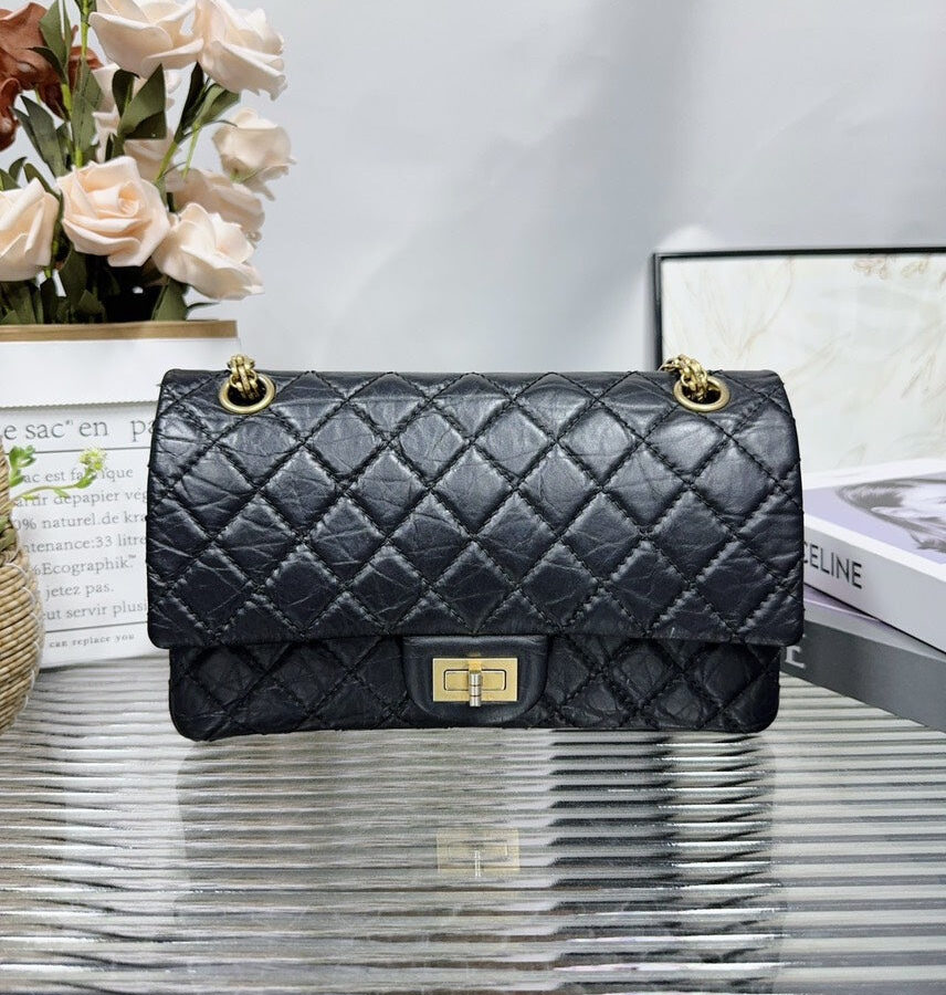 Chanel Classic Black Quilted Leather Flap Bag | Studio Nafay